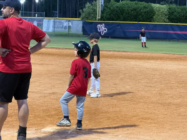 Youth baseball players on the field