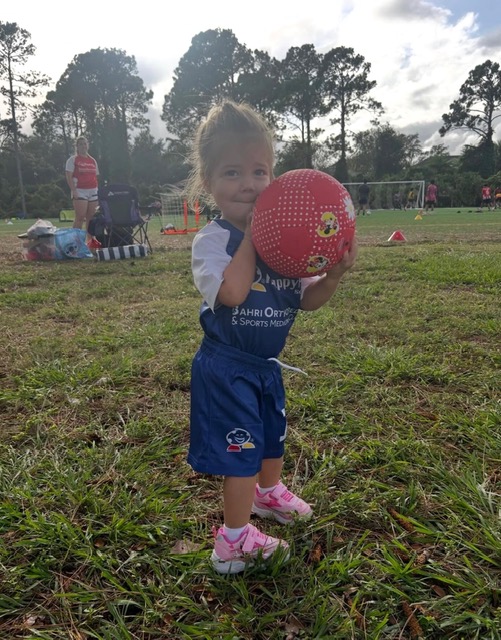 Young soccer players in action